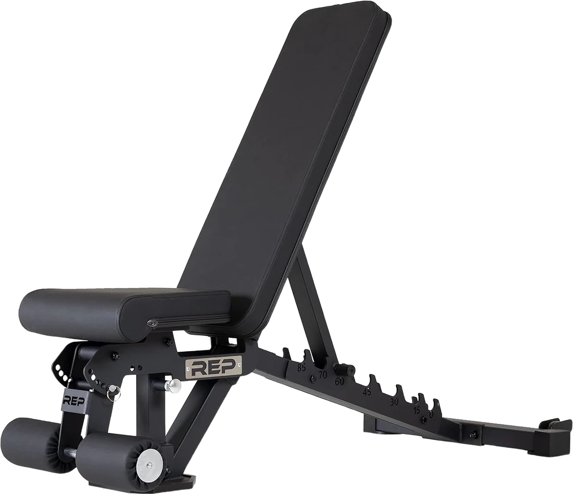 REP Fitness AB-3000 FID adjustable weight bench in matte black, set to incline with firm padded seat and back, commercial-grade steel frame — from Amazon listing